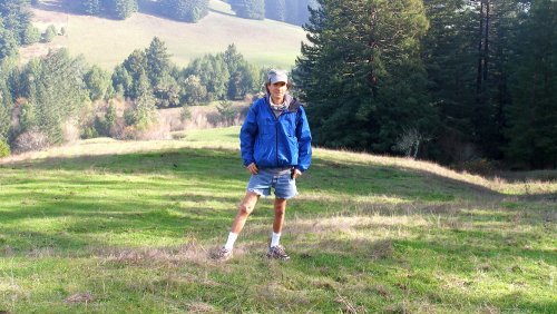 Raw Vegan Transformations - David Klein standing in a field - colitis - Crohn's - IBD - Fruit-Powered