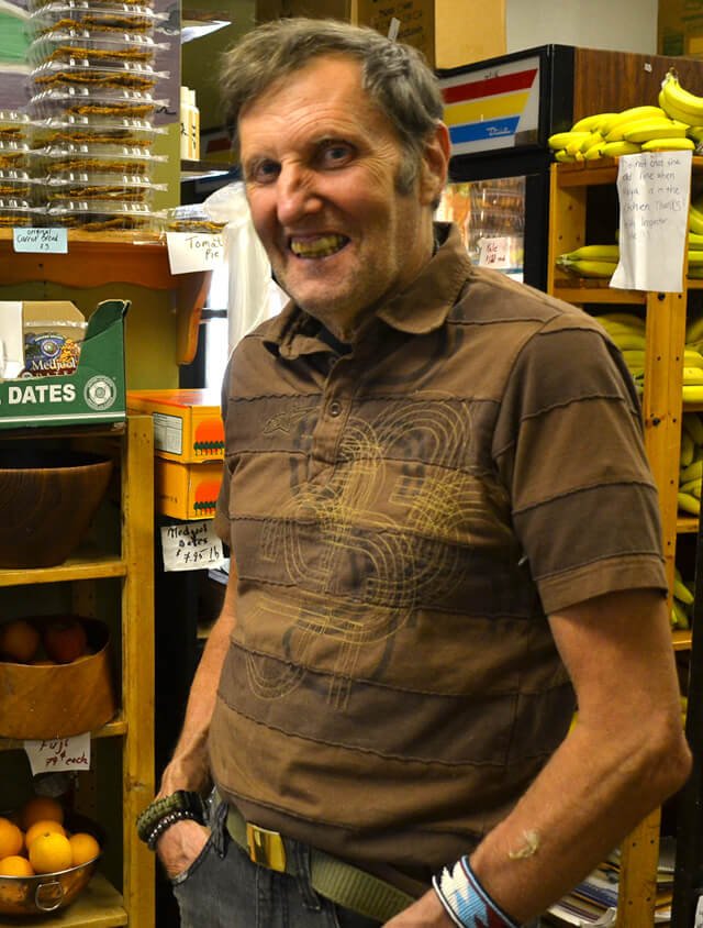 Arnold Kauffman smiles at work at Arnold's Way