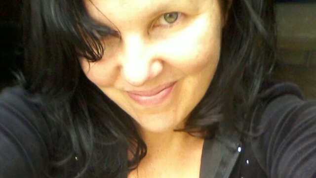 Closeup of Joy King, wearing a black shirt