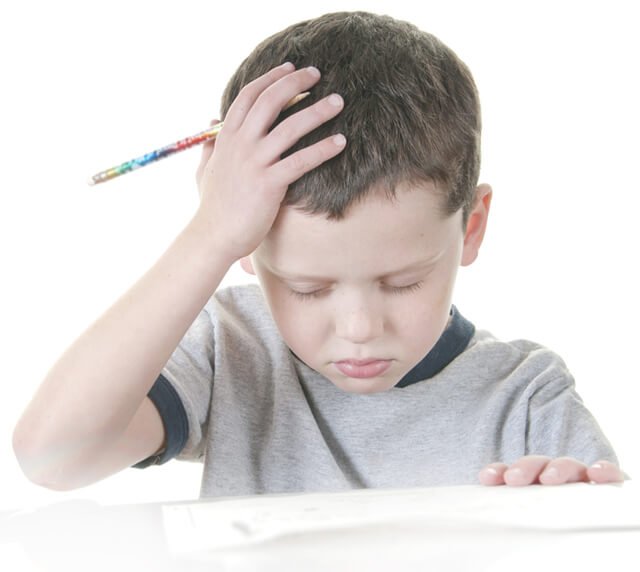 Boy stressed with school work