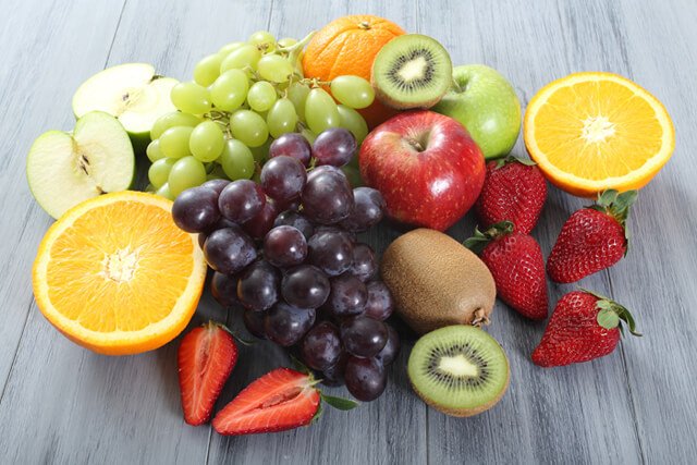 Fruits rest on a table