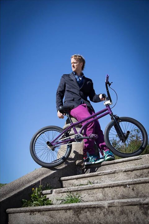 Timothy Radley stands beside his BMX bicycle in San Francisco