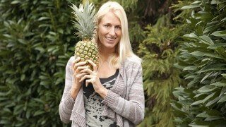 Natalie Lenka holds a pineapple