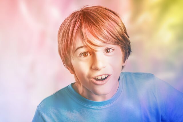 Boy lost in a colorful dreamworld