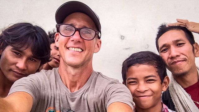 Mark Tassi photographs himself and others in Cambodia