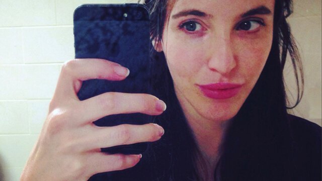 Jenny Lapan takes a self-photo in a mirror