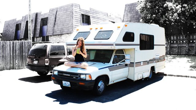 Brittany Taylor sitting on her RV, Winnie