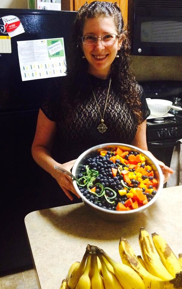 rebecca-rosenberg-holding-a-raw-food-dish