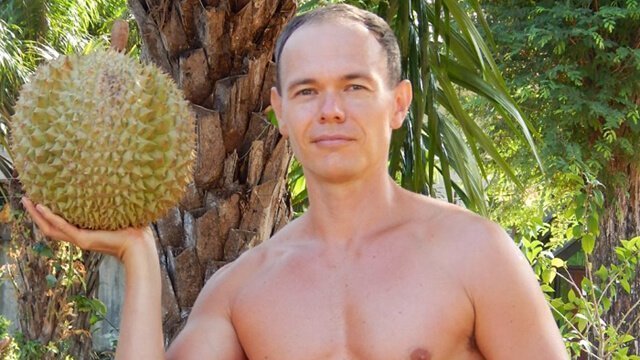 Petr Cech hoists a durian in Koh Lanta