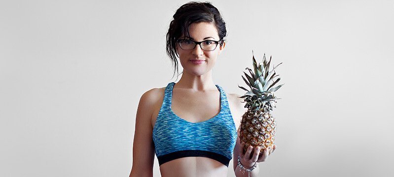 Melissa Raimondi holds a pineapple