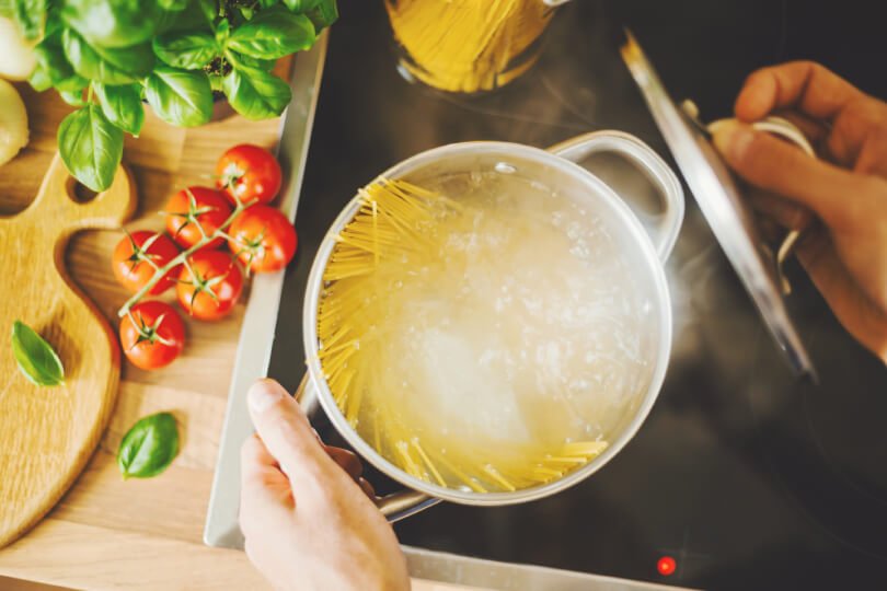 Coquism - female hand - cooking spaghetti - Fruit-Powered