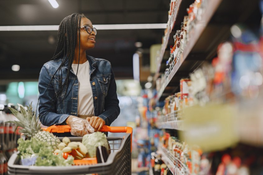 COVID-19 and vaccine hysteria - woman shopping in a supermarket - Fruit-Powered