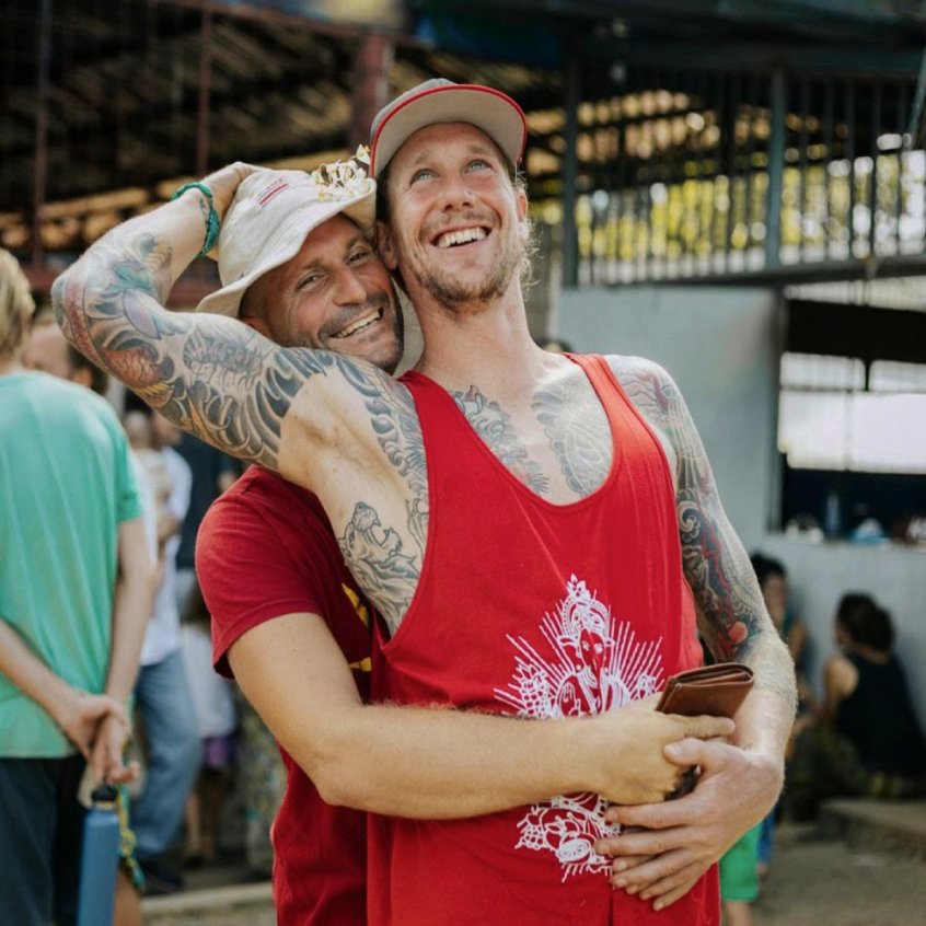 Brian Calvi and Chris Kendall embrace - Farm of Life retreat - Costa Rica - Fruit-Powered
