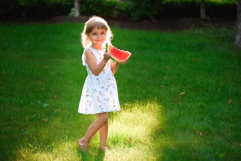 Nature's laws - girl holding watermelon wedge - Fruit-Powered