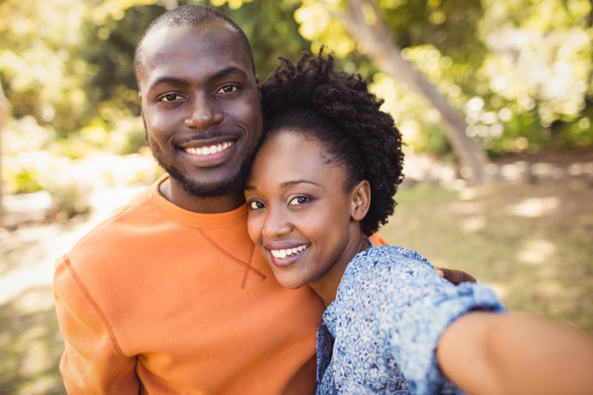 Happy couple smiling - Fruit-Powered